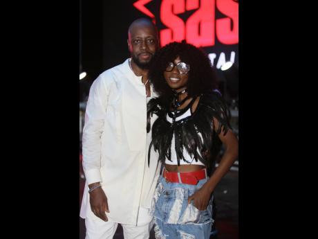 Haitian rapper and Sashi’s host, Wyclef Jean (left), shared a moment with aspiring artiste from Las Vegas, Chaize ‘ChaiXe’ Macklin at Sashi Live on Saturday. 