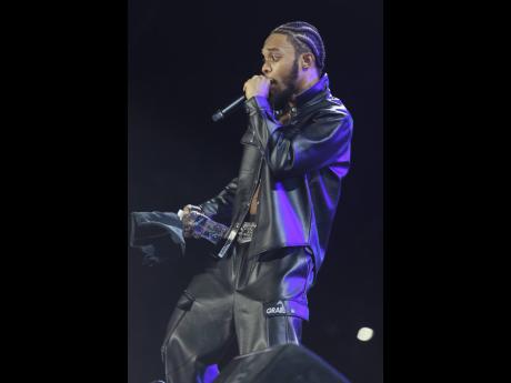 Dancehall 'hot topic' Bayka in the height of his energetic performance during the Sashi juggling segment for the 'youngest and hottest' in dancehall.