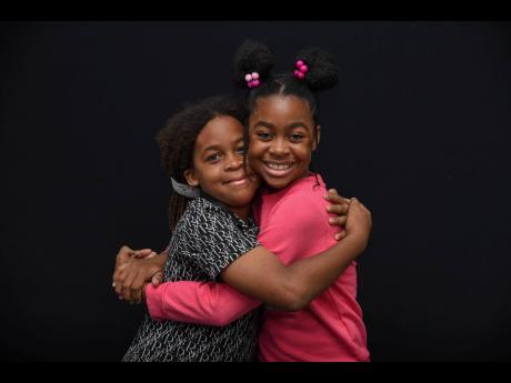 Supertwinz Tafari (left) and Ngozi Wright.