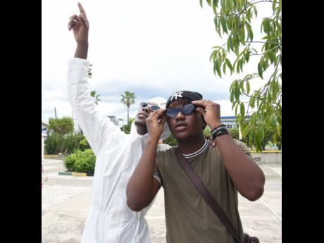 Credit: Ian Allen Pyneer (left) interacts with a fan.
