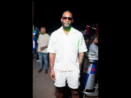Coming straight from London, Kevin Brown looks dapper in his all-white ensemble while partying.