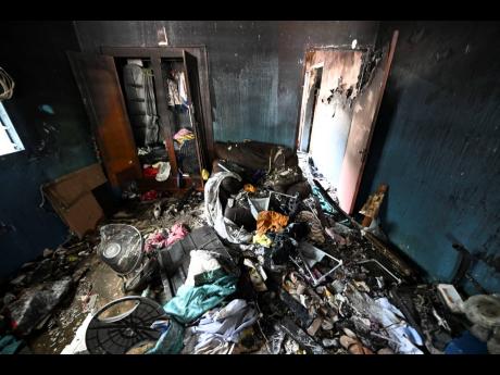 Credit: Ricardo Makyn The Dalhouses lost a home to fire more than 15 years ago, and have now suffered another major loss.