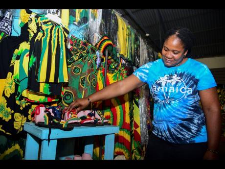 Credit: Antoine Lodge Samuels not only draws the patterns, she cuts the leather for the soles as well.