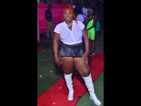 Sexy Suggie, promoter of the event, says hi to the STAR camera.