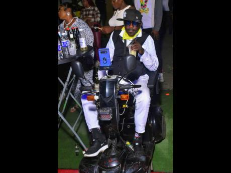 Decca wheels his way around the event.