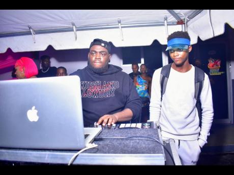 Vybz 13 at the musical consoles.