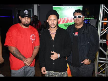 Circa Eleven’s Myers brothers Mark Myers (left) and Phillip Myers flank recording artiste Tessellated. 