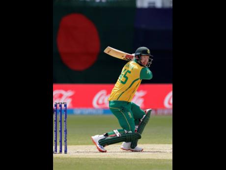 South Africa’s Heinrich Klaasen hits a boundary during the ICC Men’s T20 World Cup cricket match between Bangladesh and South Africa at the Nassau County International Cricket Stadium in Westbury, New York, yesterday. 
