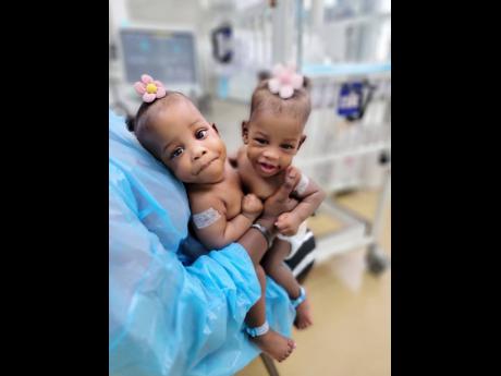 Credit: Contributed The Elson twins, Azora and Azaria continue to defy the odds.