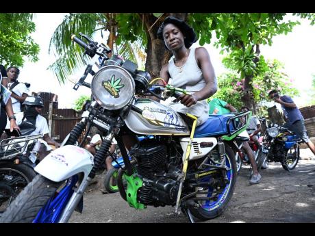 Credit: Rudolph Brown ‘Goodas Stunts refuses to let the loss of a leg stop her from riding motorcycles.