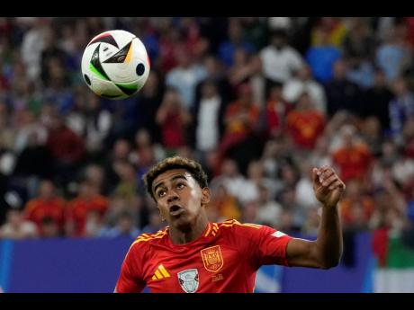 Spain’s Lamine Yamal controls the ball during a Group B match between Spain and Italy at the Euro 2024  football tournament in Gelsenkirchen, Germany, yesterday. 