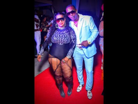 Camy Doll chills with Star Boy.
