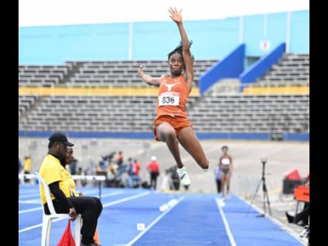 Ackelia Smith competing in the women’s long jump on yesterday’s opening day of the JAAA/Puma National Junior and  Senior Championships at the National Stadium. 	