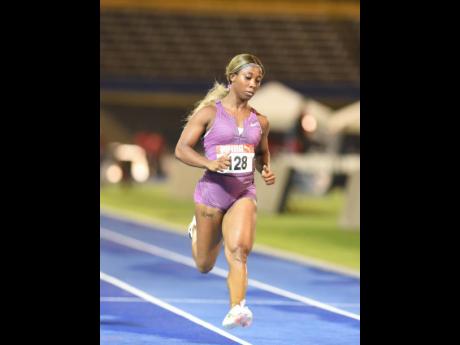Shelly-Ann Fraser-Pryce, the fastest qualifier with 10.98 seconds,  looks comfortable in the first round of the women’s 100 metres at the JAAA/Puma National Junior and Senior National Championships last night. 