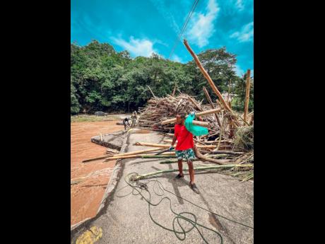 Credit: Contributed YouTuber Claud Watkis: “This is our Jamaica and Beryl affected us in one way or another so this was just our way of assisting.”