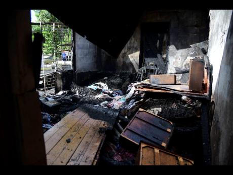 Credit: Antoine Lodge Thirteen persons, six of them children, are now homeless following the blaze.