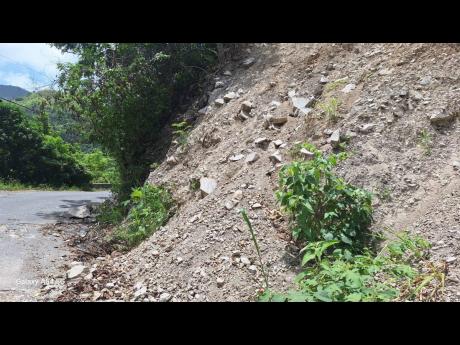 Credit: Almando Smith Photos One of several landslides that Grant and other residents have to deal with.
