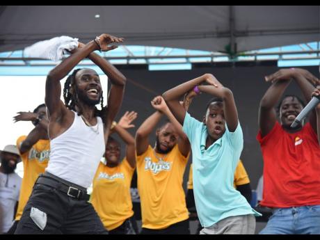 DJ Brainz (second right) even showed off his dance moves doing the 'Leggo di Bird' with Laa Lee on stage. 