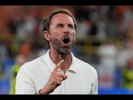 England’s manager Gareth Southgate celebrates at the end of a semifinal against Netherlands at the Euro 2024 football  tournament in Dortmund, Germany, Wednesday, July 10, 2024. England won the game 2-1. 