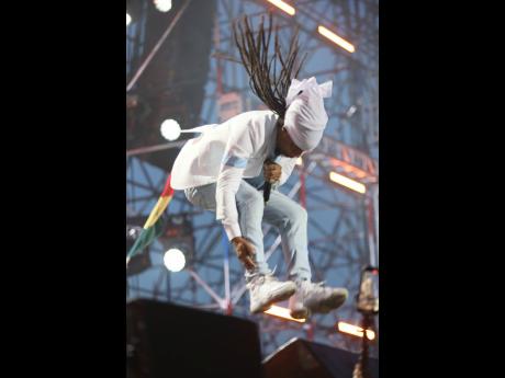 Turbulence’s locks go flying during his energetic performance at Reggae Sumfest last Friday.