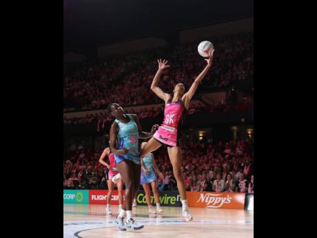 Credit: @supernetball Shamera Sterling-HUmphrey (right) in action for the Adelaide Thunderbirds.