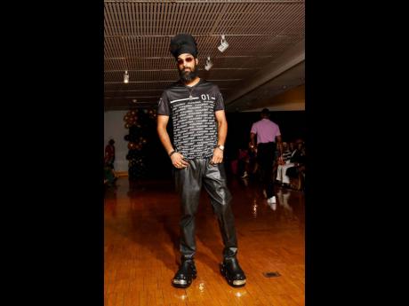 Latino reggae artiste I-Majesty showcases the A’Legends clothing line.