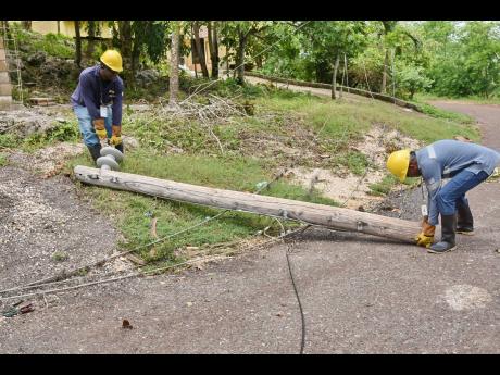 A Jamaica Public Service team at work.