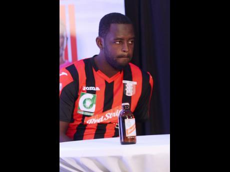 Credit: File Photo shows Oneil ‘Bigga’ Thompson at a press conference while he was captain of Arnett Gardens FC. Thompson has taken on the role of head coach of Clarendon’s Jamaica Premier League team Chapelton Maroons.
