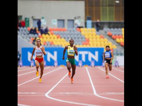 Credit: @WorldAthletics Jamaica’s pre-race favourite Alana Reid (centre) clocks 11.46 seconds to win her 100 metres heat at the World Under-20 Championships in Lima, Peru yesterday.