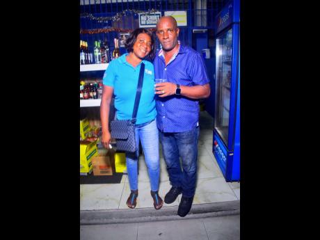 Triston Tulloch, aka Touch a Blue Boss, and wife Lorraine Tulloch, aka Lady Blue, pose for the STAR camera.