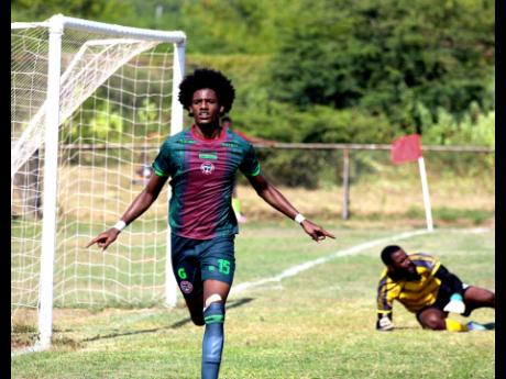Credit: Lennox Aldred Montego Bay United’s Jordan Britto runs off in celebration after putting his team ahead against Vere United during their Jamaica Premier League encounter at the Wembley Centre of Excellence yesterday. Goalkeeper Mikhail Harrison looks on. MoBay United won 4-1.