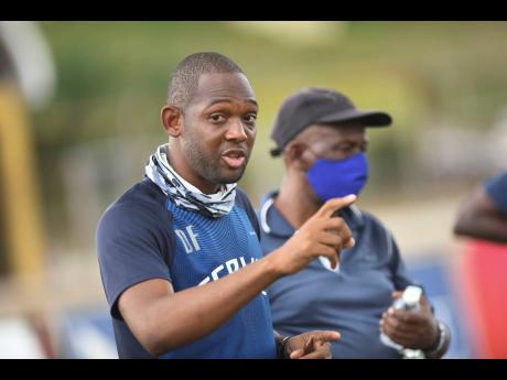 Credit: Ricardo Makyn Jamaica College’s coach Davion Ferguson.