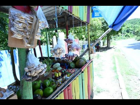 Credit: Rudolph Brown Despite having a variety of items, D&J One Shop has no customers to buy them..