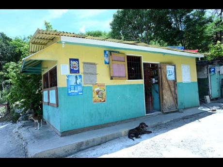 Credit: Rudolph Brown This shop is one of many in the 11 Miles area that has seen little business since the highway was implemented.