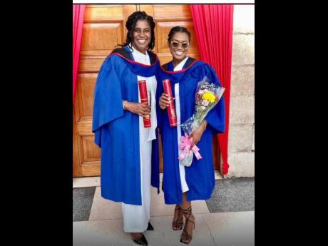 Credit: Contributed Family of Law: Julian Redwood-Johnson (left) and daughter Danielle Johnson celebrate their joint graduation from Norman Manley Law School last weekend.