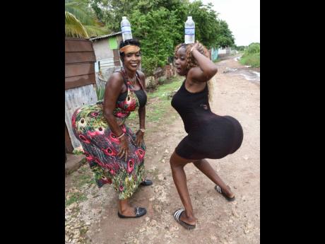 Credit: Ian Allen Ophelia Pierce (left) and Kerry-Ann Hamilton keep fans guessing with their wild acts.