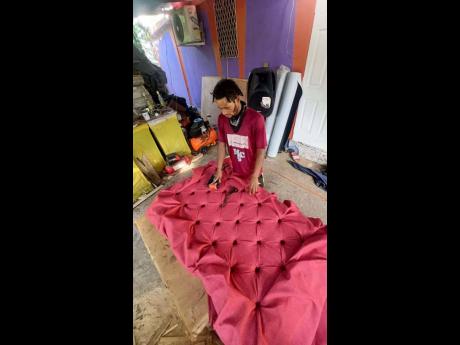 Credit: Contributed Gordon working on a piece for a customer.