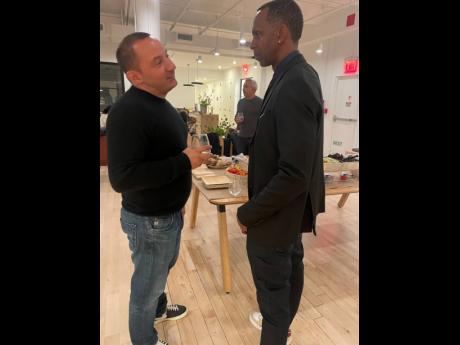 Credit: Andre Williams Joe Primiano (left), owner of Springville Villa in Montego Bay, who is a donor to Pencils4kids, chats with founder of the charitable organisation, Randy Griffiths.