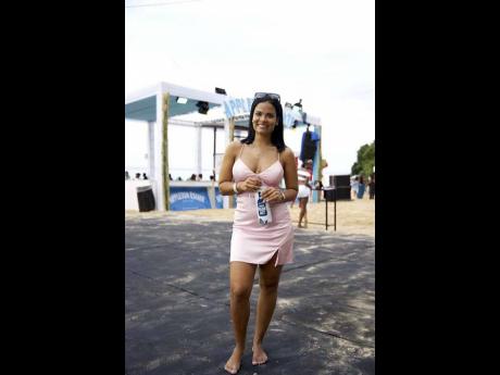 Credit: Contributed Jessica Chang took a break from the nightlife, swapping club lights for beachside fun, bringing energy to the festive atmosphere.