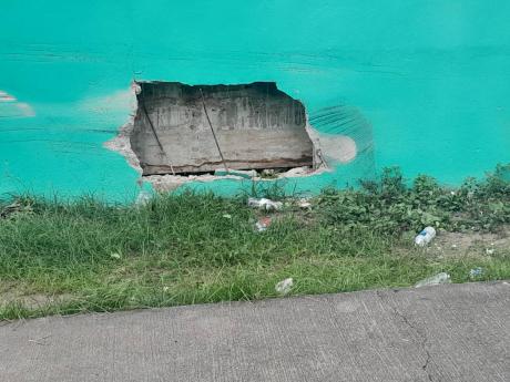 Credit: Simone Morgan-Lindo Scenes of the crash that took the life of Jaheim Morrison along Woodpecker Avenue.