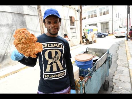 Credit: Rudolph Brown The ‘Fritters King’ of downtown Kingston, Andrew Burke.