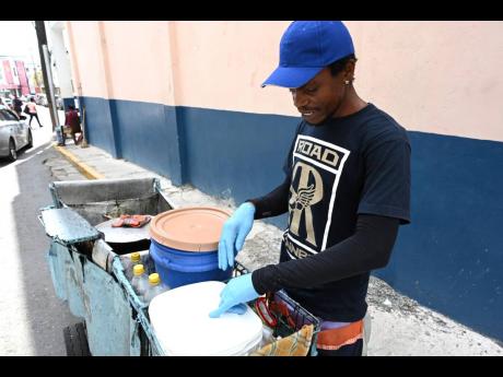 Credit: Rudolph Brown Burke said that he starts preparation to sell fritters from as early as 4 a.m.