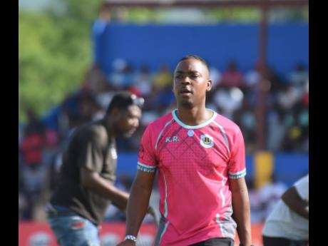 Munro College’s head coach Kemar Ricketts on the sidelines during their ISSA/WATA daCosta Cup football match against St Elizabeth Technical High School (STETHS) at STETHS Sports Complex on Saturday, October 12.