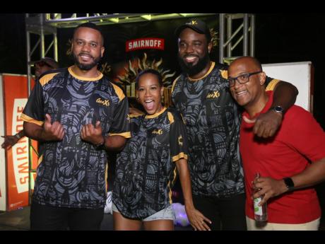 Credit: Nathaniel Stewart Photos by Nathaniel Stewart/Photographer
Celebrating bold ideas and creativity (from left) Matthew Waddell, Briana Schwapp, and Kino Johnson of GenXS share a moment with Sean Wallace at the GenXS viewing party.