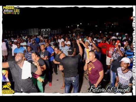 Credit: Contributed Patrons enjoying the musical juggling from the Festival of Sounds party held previously.