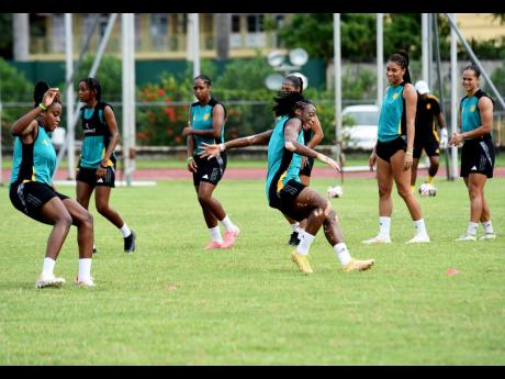 Credit: Ashley Anguin Jamaica’s Reggae Girlz warm up ahead of a training session at the Montego Bay Sports Complex on Thursday. The Jamaicans are preparing for a friendly international against South Africa Women at Montego Bay Sports Complex in Catherine Hall, St James on Friday.