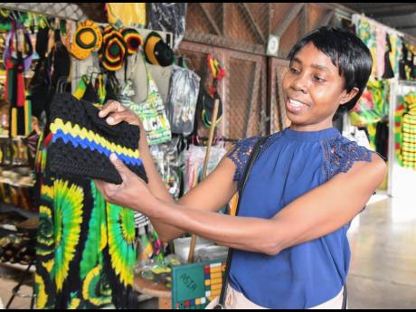 Credit: Antoine Lodge Camille Green shows off one of her crochet tams.
