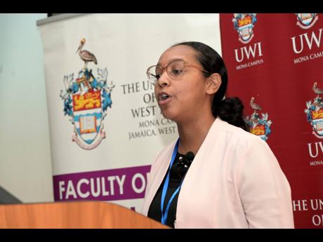 Credit: Rudolph Brown Alexi-Jade Lyew speaking at the Dying to be Beautiful symposium held at The University of the West Indies, Mona, last weekend.