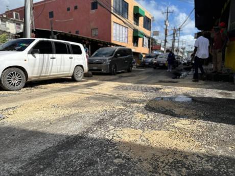 Business operators and residents cleaned up this section of Union Street early Monday morning as they could no longer stand the sewage.