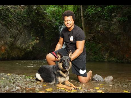 Dog-sitter Justin Marr, owner of Chick Lab in Stony Hill, St Andrew. 